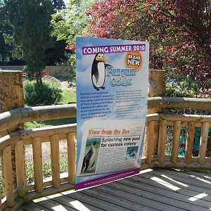 Sign advertising new penguin exhibit
