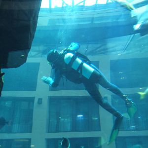 View of diver cleaning glass