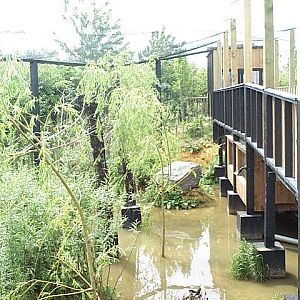 view of bridge along side of aviary.