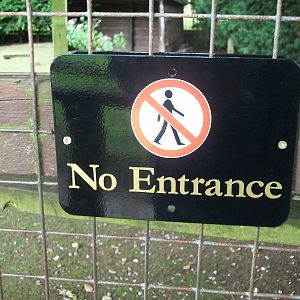 New signage on the walk-through aviary exit door, 8th August 2014
