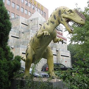 dinosaur model outside the museum