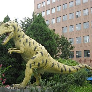 dinosaur model outside the museum
