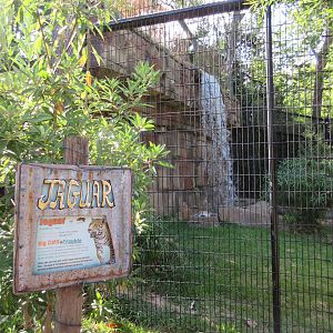 Jaguar Exhibit #1 - Sign + Waterfall