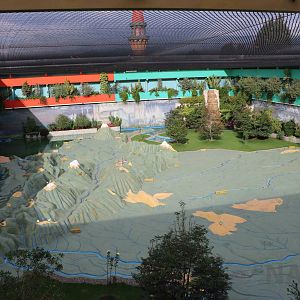 An enormous indoor map of Colombia with several free-flying birds, March 20