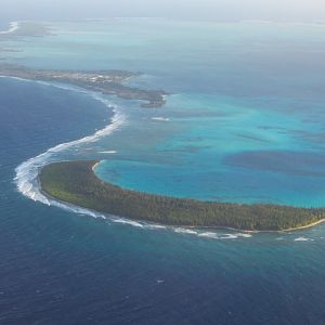 Direction Island in the foreground, Home Island behind it.