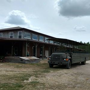 Main building and truck/jeep used on tours.