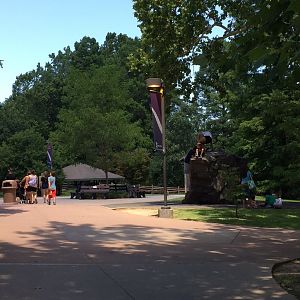 Pathway near Tropical American Rainforest Building with children on climbing rock
