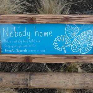Signage on new Prevost's Squirrel enclosures in Islands