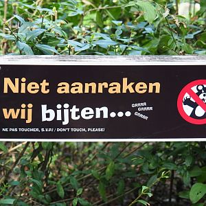 Don't touch, we bite sign