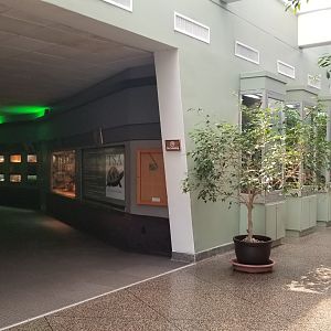 to the left of herp entrance