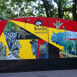Paintings on gate to behind-the-scenes area