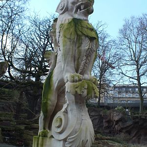 Lion Statue overlooking path.