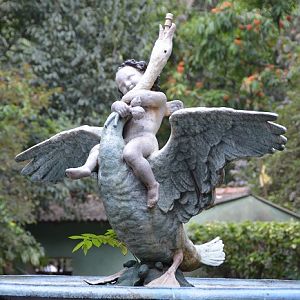 Statue.  Boy stangling a swan??