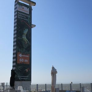 Huge sign on beach boardwalk
