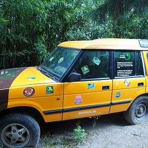 Vehicle with wildlife conservation charity information and animal sponsorship signs, 2019-08-11