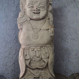 Assorted objects in the entrance corridor to the tropical house - Buddha statue, 2019-08-04
