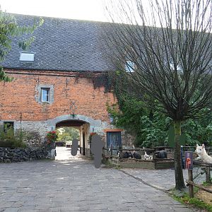 View of the farm area and the farm building with passageway, 2019-10-04