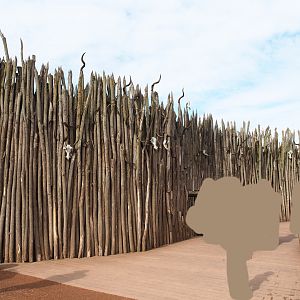 Wooden structure with (mock?) animal skulls around lion separation exhibit, 2019-10-04