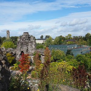 Typical Pairi Daiza landscape with Asian temples, Mersus Emergo reptile house ship, abbey tower and aquarium, 2019-10-04