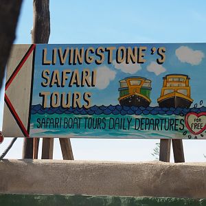 Safari boat tours sign, 2019-09-15