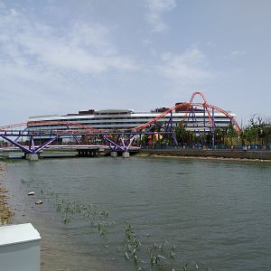 Roller Coaster Crossing The Canal
