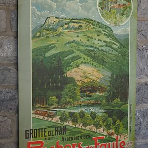 Old ad poster for railroad to Caves of Han, 2020-07-12