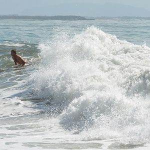 Surfing at Blackhead beach.