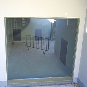 Viewing window into new indoor exhibit next to the access to the new pig house viewing area, 2020-09-20