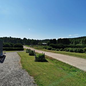 Aviaries to the left and mouflon/fallow deer enclosure in the distance