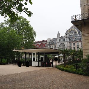 Entrance of the zoo, seen from within the zoo, with Antwerp Central Station in the background, 2021-06-12
