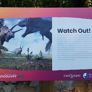 Prehistoric Battle between Predator & Prey Sign