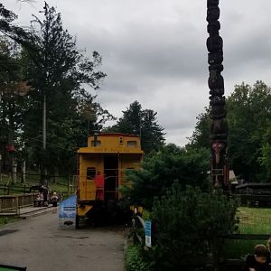 Elmwood Park - Totem and train car with bison info