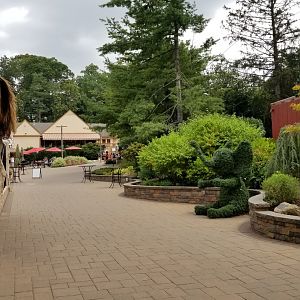 Elmwood Park - Path in front of barnyard, zoo entrance/exit in distance