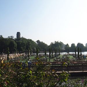 Pontoon terrace on the lake, with floatplane and old abbey tower in the background, 2021-09-02