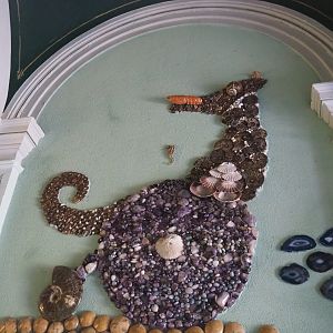 Seahorse artwork in the corridor near the aquarium building restrooms, 2021-09-03