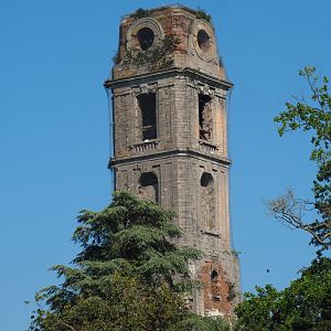 Old Cistercian abbey tower above a treeline, 2021-09-03