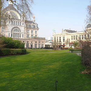 Park view with Central Station, Grand Café Flamingo, part of flamingo exhibit and administration/conference building, 2022-03-16