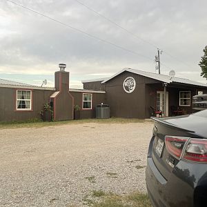 CARE Giftshop and Main House Exterior