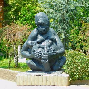 Motherly simian statue