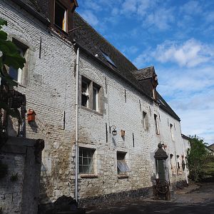 Old building with stables for farm area and visitor passage, 2022-09-15