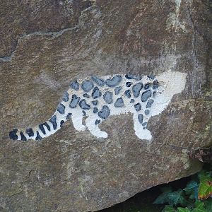 Small snow leopard artwork on rock, 2022-02-12