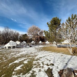 Yurts surrounding communal firepit