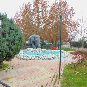 Pond with Elephant Statue at Karatay Zoo