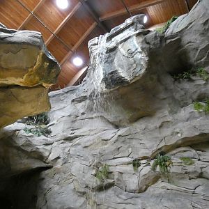 Waterfall in front of the Mountains exhibit