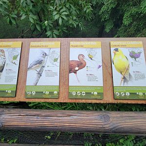 Columbus Zoo - North America Songbird Aviary signs, wood thrush - tufted titmouse - white-faced ibis - American goldfinch