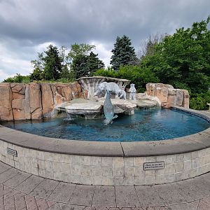 Toledo Zoo - Polar bear and seal statue in Blade Plaza