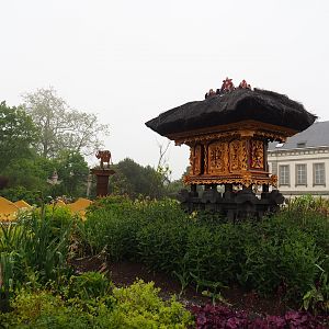 "Egg of the World" entrance area - Small representation of Balinese temples, With 1854 castle aquarium building behind it, 2023-05-16