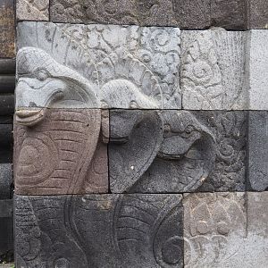 Cobra stone carvings on one of the Asian temples, 2023-05-15
