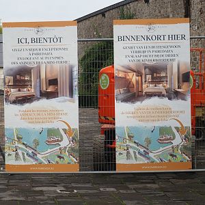 Signage about future Farmhouse Lodges and temporary petting zoo, 2023-10-13