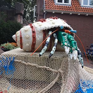 Recycled materials artwork exhibition - Hermit crab made from plastic and fishing nets, 2023-08-17